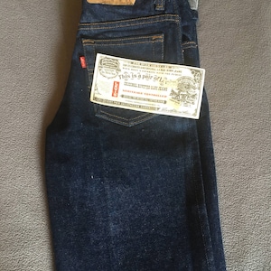 Vintage levis deadstock straight leg red tabs jeans size 26x33 rare new with tags