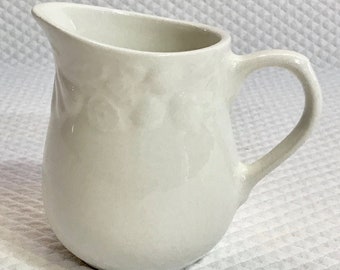 Gibson Designs Embossed white Fruit Creamer/Small Syrup pitcher