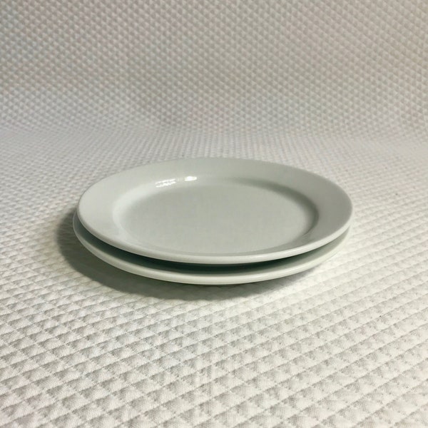 Set of two 6 1/2" diameter Williams-Sonoma white appetizer or bread plates.