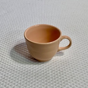 Vintage peach Fiesta Ware mug, Made in USA.