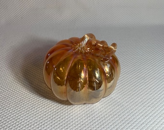 Hand-blown, iridescent orange art glass pumpkin