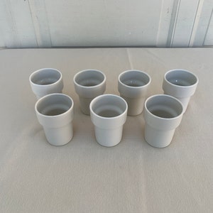 Set of 7 modern white glazed ceramic planter with smooth surface