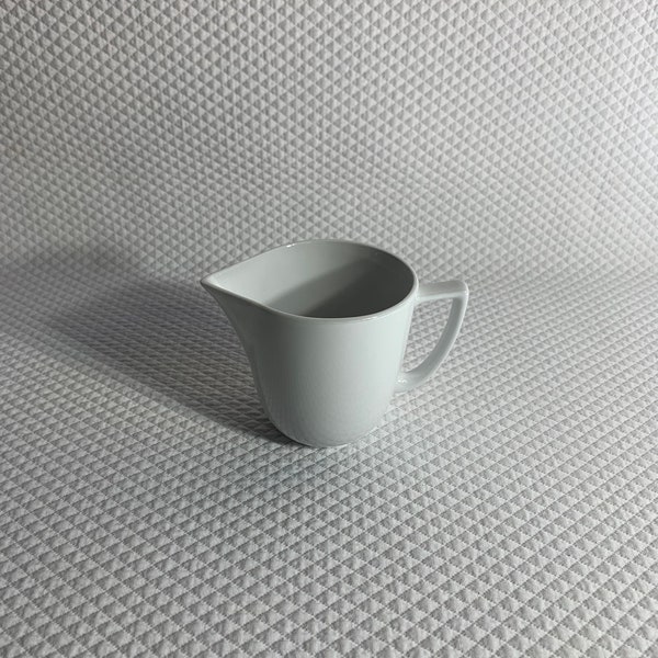 White cream pitcher made by Restoration Hardware