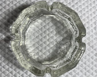 Vintage heavy clear pressed glass ashtray.