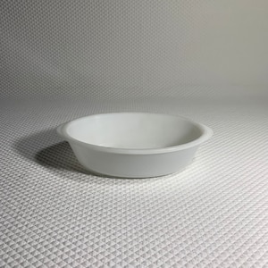 Vintage Glassbake milk glass oval casserole dish.