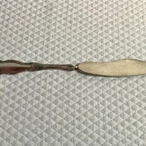 Vintage silver plated Wm Rogers & Sons AA twisted butter knife spreader