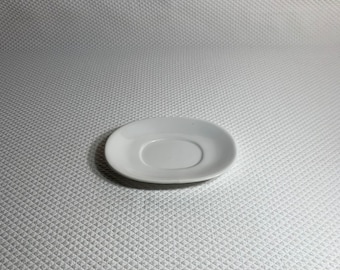 White porcelain oval stoneware soap dish unmarked.
