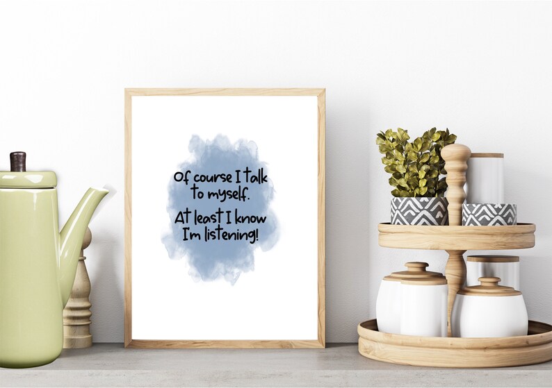 May include: A framed print with a blue watercolor background and the text "Of course I talk to myself. At least I know I'm listening!"