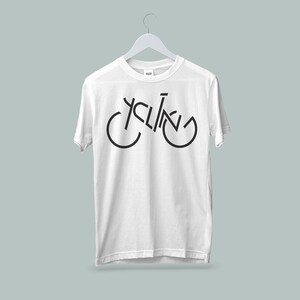 May include: White t-shirt with a black graphic of a bicycle with the word "cycling" incorporated into the design.