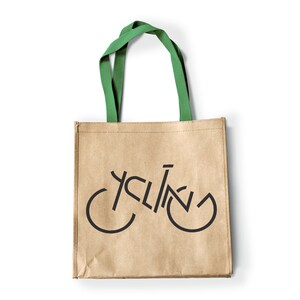 May include: A brown paper tote bag with green handles. The bag has a black graphic of a bicycle with the word "cycling" incorporated into the design.