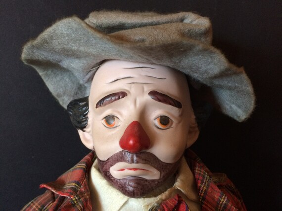 sad clown porcelain doll