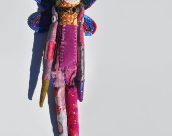 Muñeca espiritual con alas