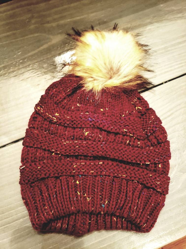 Slouchy knit pom pom hat