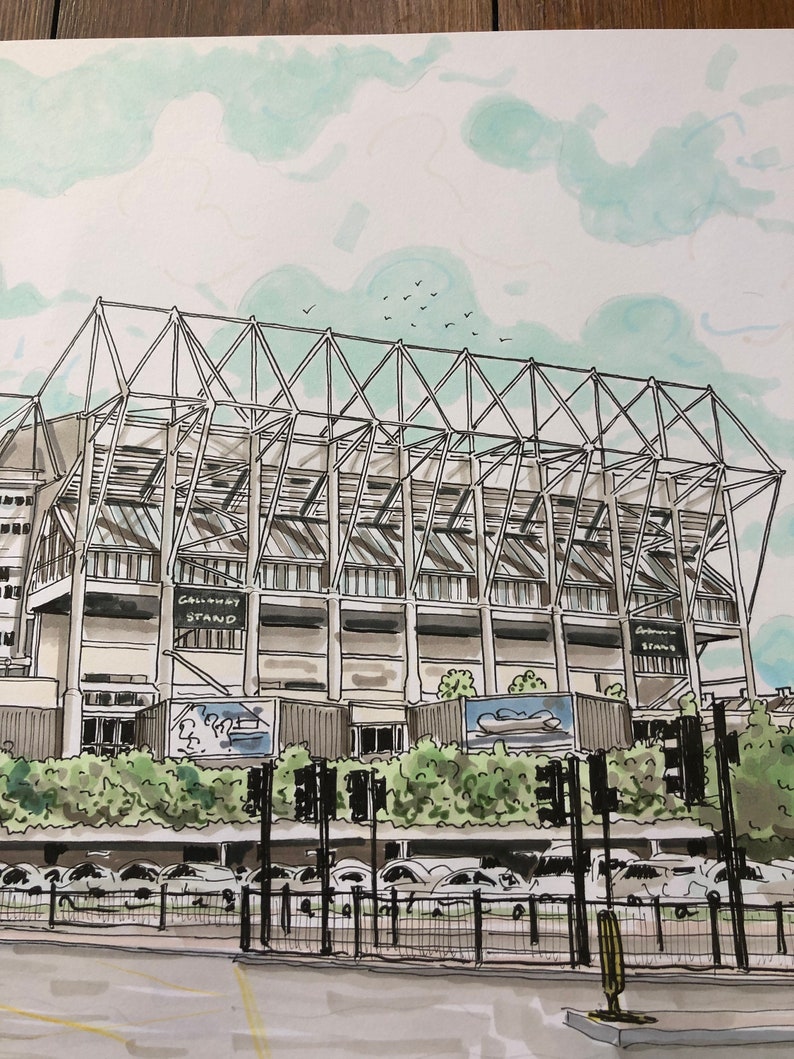 May include: A black and white illustration of a large stadium with a white roof and a sign that reads "Galway Stand". The stadium is surrounded by trees and a parking lot.