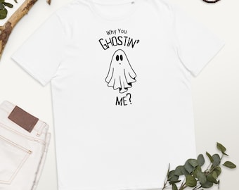 May include: White t-shirt with a black ghost graphic and the text "Why You Ghostin' Me?"
