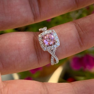 Pink tourmaline Halo Diamond Engagement ring in 14k White gold.