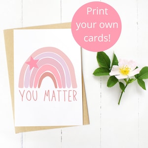 May include: A printable card featuring a pink and purple rainbow with a pink star on top. The text "You Matter" is written below the rainbow.