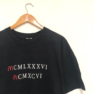 Camiseta vintage original de los años 90 con texto romano