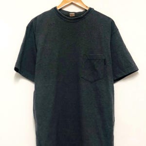 Camiseta vintage Stussy de un solo bolsillo de los años 2000 / Ropa urbana / Rara / XL