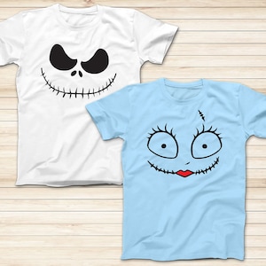 May include: Two t-shirts with a black and white graphic of Jack Skellington and Sally from the Nightmare Before Christmas movie. The Jack Skellington t-shirt is white and the Sally t-shirt is light blue.