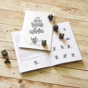 The Little Book of Spells A6 magic mini game zine - fantasy tabletop game, role playing dice, geek gift, witch wizard storytelling