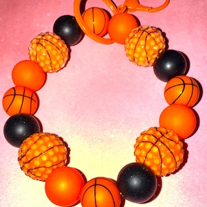 Beaded sports and Christmas themed keychain or wallet wristlets