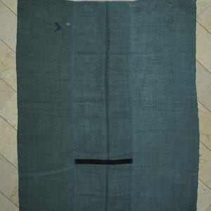 a large, rectangular piece of fabric with a black line running through the center.