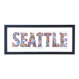 May include: A framed print of the word "SEATTLE" made up of small images of iconic Seattle landmarks. The text "ICONIC SEATTLE EST. 1851" is printed below the word.