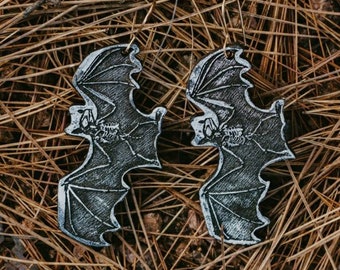 Black Bat with bones earrings - laser engraved wood with hand-painted black shimmer and brass hooks- Halloween, fall fashion, spooky jewelry