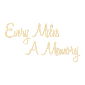 May include: Wooden sign with the text "Every Mile's A Memory" in a cursive font.