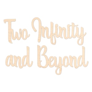 May include: Wooden cut-out letters spelling "Two Infinity and Beyond" in a cursive font. The letters are made of light-colored wood and are unpainted. The phrase is a popular quote from a children's animated movie.