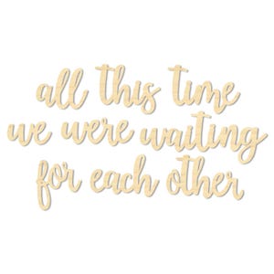 May include: Wooden sign with the text "all this time we were waiting for each other".