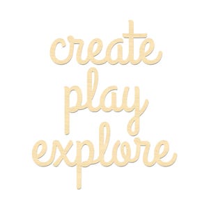 May include: Wooden sign with the words "create play explore" in a cursive font.