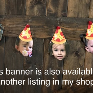 May include: A banner with four pizza slice-shaped cutouts featuring photos of children wearing pizza party hats. The banner is strung with twine and hangs against a wood background. The text "This banner is also available in another listing in my shop!" is printed below the banner.
