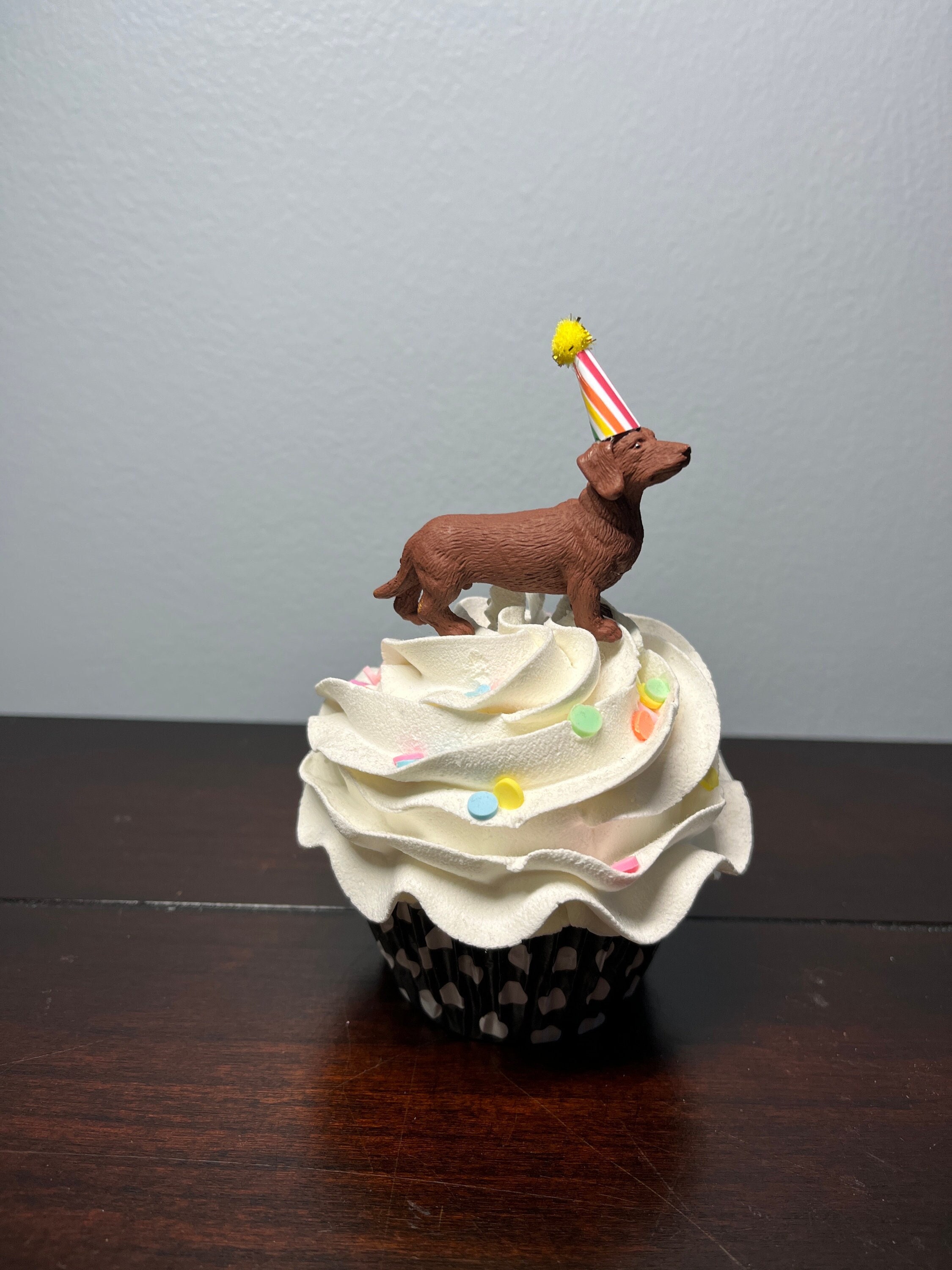 Sausage dog top cupcake cake