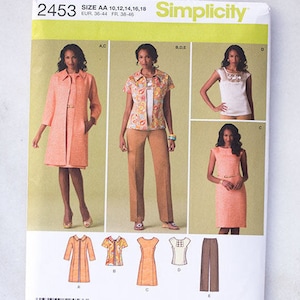 May include: A sewing pattern for a dress, jacket, and blouse. The pattern is for sizes 10-18 and includes instructions for making a dress, jacket, and blouse. The pattern is from Simplicity and has the number 2453 on it.