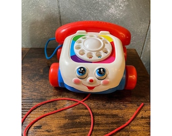 Teléfono de juguete vintage Fisher Price, juguete clásico (1961-1983)