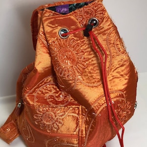 Embroidered Sling Backpack: Drawstring Travel Bag