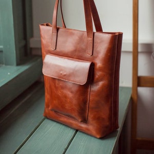 Women's leather tote with laptop compartment top