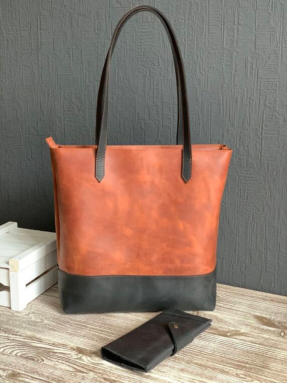 Black tote with brown handles hotsell