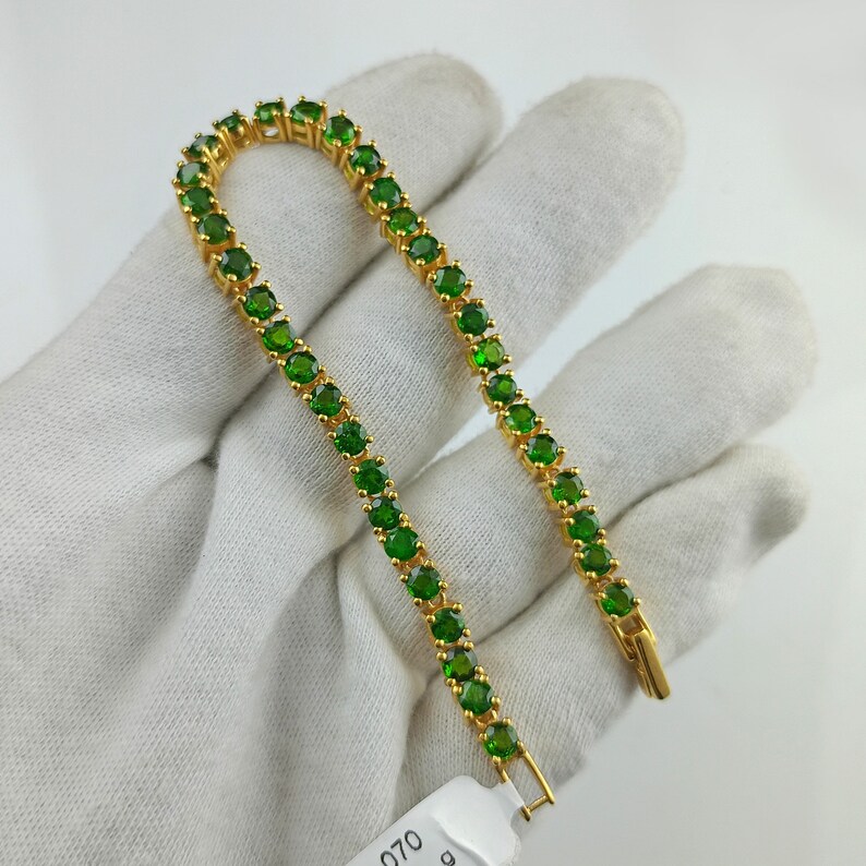 This beautiful tennis bracelet is handmade of 925 sterling silver, gold plated, and studded with prong set round cut chrome diopside gemstone. best gift for women and girls.
Chrome Diopside Bracelet
Tennis Bracelet
Handmade Bracelet
14K Gold Bracelet