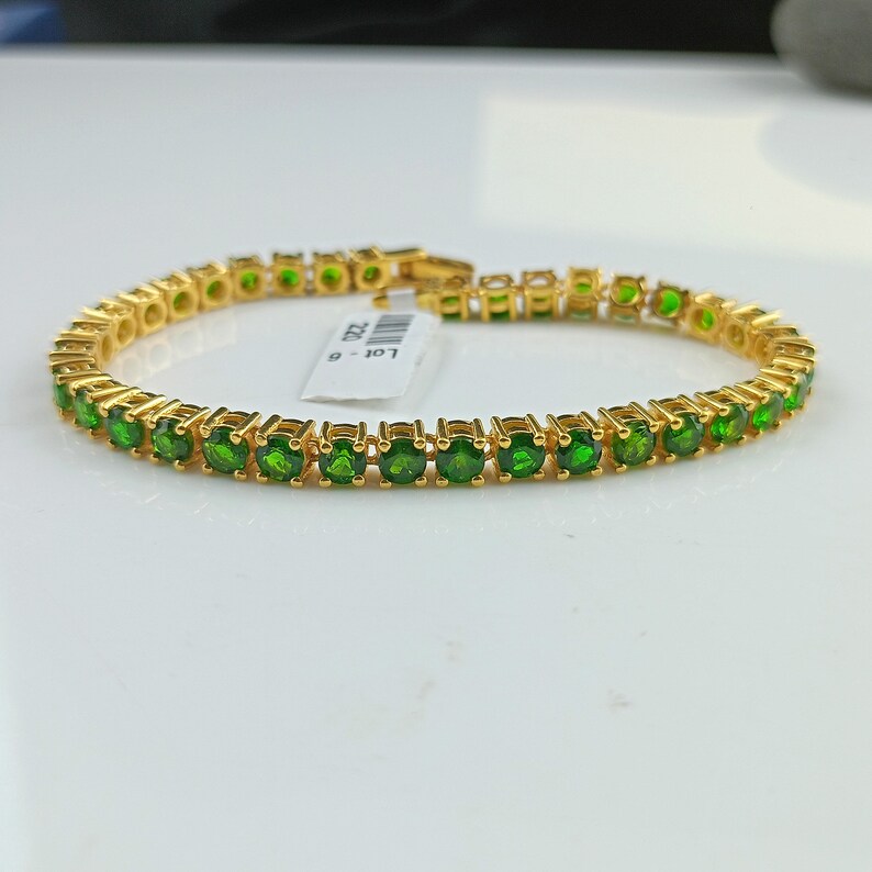 This beautiful tennis bracelet is handmade of 925 sterling silver, gold plated, and studded with prong set round cut chrome diopside gemstone. best gift for women and girls.
Chrome Diopside Bracelet
Tennis Bracelet
Handmade Bracelet
14K Gold Bracelet