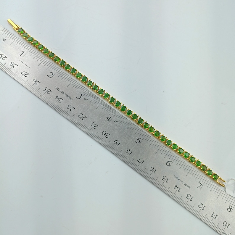 This beautiful tennis bracelet is handmade of 925 sterling silver, gold plated, and studded with prong set round cut chrome diopside gemstone. best gift for women and girls.
Chrome Diopside Bracelet
Tennis Bracelet
Handmade Bracelet
14K Gold Bracelet