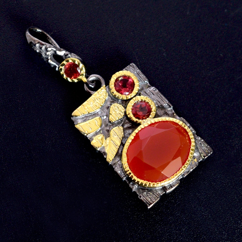 This beautiful boho pendant handmade of 925 sterling silver black rhodium gold plated and studded with natural carnelian gemstone. Best jewelry gift for women and girls.