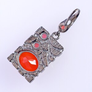 This beautiful boho pendant handmade of 925 sterling silver black rhodium gold plated and studded with natural carnelian gemstone. Best jewelry gift for women and girls.