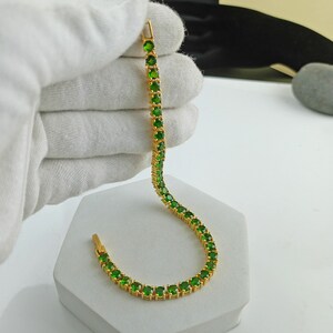 This beautiful tennis bracelet is handmade of 925 sterling silver, gold plated, and studded with prong set round cut chrome diopside gemstone. best gift for women and girls.
Chrome Diopside Bracelet
Tennis Bracelet
Handmade Bracelet
14K Gold Bracelet