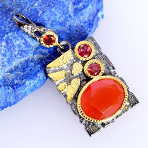 This beautiful boho pendant handmade of 925 sterling silver black rhodium gold plated and studded with natural carnelian gemstone. Best jewelry gift for women and girls.