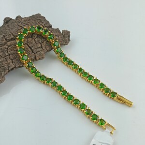 This beautiful tennis bracelet is handmade of 925 sterling silver, gold plated, and studded with prong set round cut chrome diopside gemstone. best gift for women and girls.
Chrome Diopside Bracelet
Tennis Bracelet
Handmade Bracelet
14K Gold Bracelet