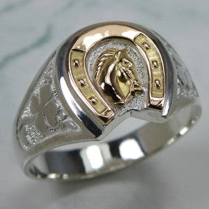 Horseshoe ring with horse head clearance
