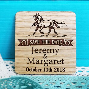 May include: Wooden save the date announcement with a horse silhouette, horseshoe, and the text "Save the Date", "Jeremy & Margaret", and "October 13th 2018".
